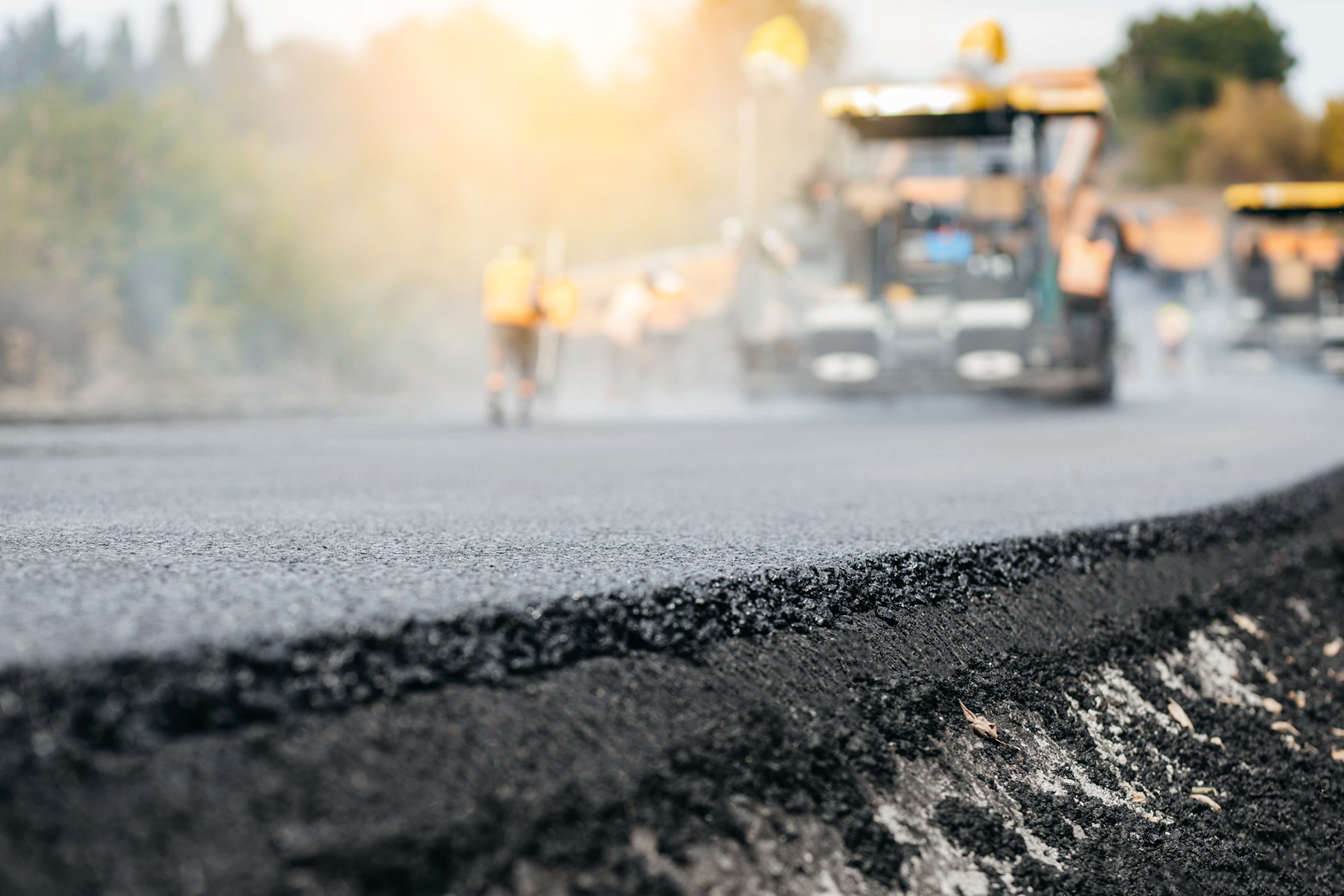 Fresh asphalt paving in progress
